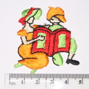 Girl and boy reading book iron on patch Girl and boy reading book iron on patch