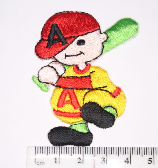 Boy holding a baseball bat iron on patch