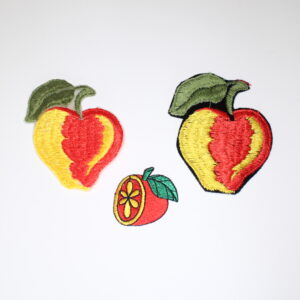 apple and tomato iron on patch Photo of an apple and tomato iron on patch