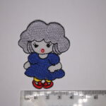 Lady wearing blues dress patch
