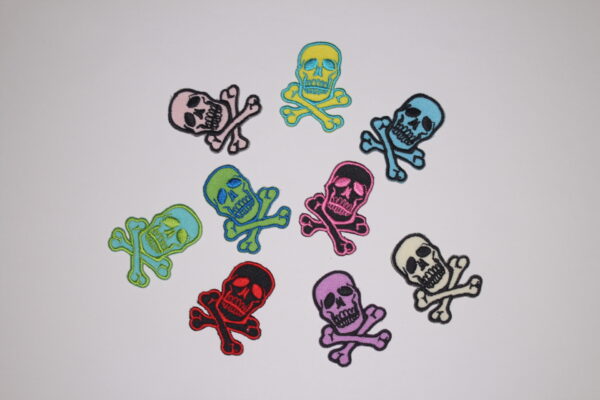 Photo of varius different colored skulls iron on patchs